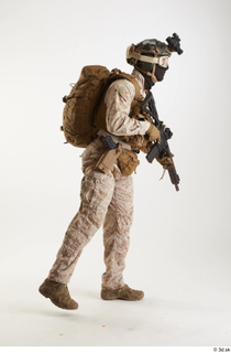 Casey Schneider Paratrooper in Desert Marpat with Gun standing walking…